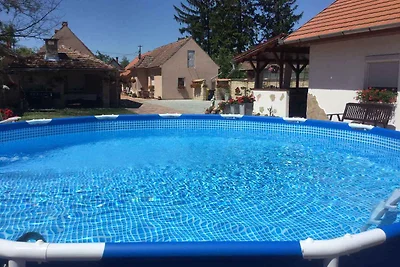 Ferienhaus mit Waschmaschine und Ofen im