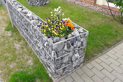 Ferienwohnung mit Terrasse im Garten