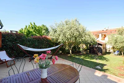 Ferienwohnung mit Garten und Klimaanlage
