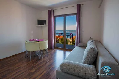 Ferienwohnung mit Poolnutzung und Meerblick