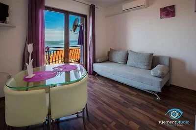 Ferienwohnung mit Poolnutzung und Meerblick