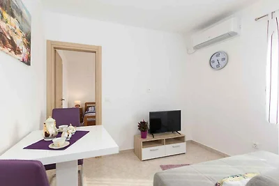 Ferienwohnung mit Meerblick und Terrasse
