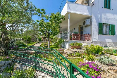 Ferienwohnung mit Garten und Klimaanlage