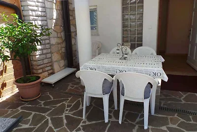 Ferienhaus mit Terrasse und Klimaanlage