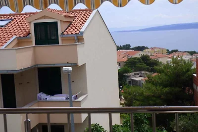 Ferienwohnung mit einen Balkon und Meerblick
