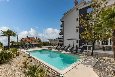 Ferienwohnung mit Pool und Meerblick