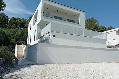 Ferienhaus mit Pool und Meerblick