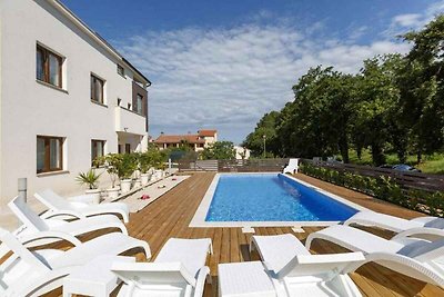 Ferienwohnung mit Pool und Meerblick