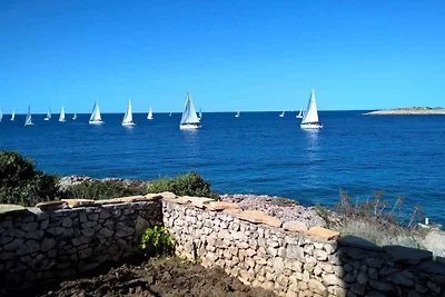 Ferienwohnung Erste Reihe am Meer (10 m)