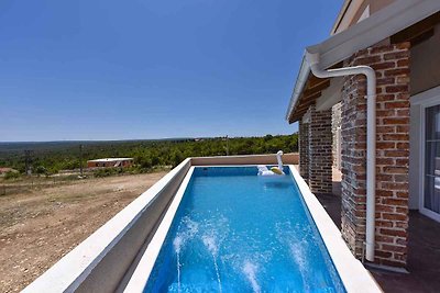 Ferienhaus mit Meerblick und Pool