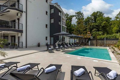 Ferienwohnung mit Pool und Meerblick