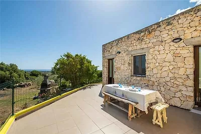 Ferienhaus mit Garten und Klimaanlage