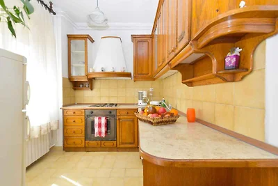 Ferienwohnung mit Balkon mit Gartenmöbeln