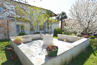 Ferienwohnung mit Balkon mit Gartenmöbeln