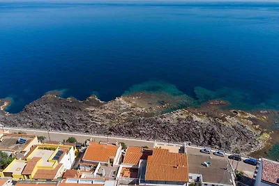 Ferienhaus mit Terrasse direkt am Meer
