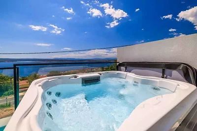 Ferienhaus mit Pool und Meerblick