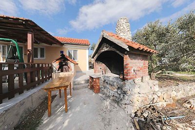 Ferienhaus mit Garten und Meerblick