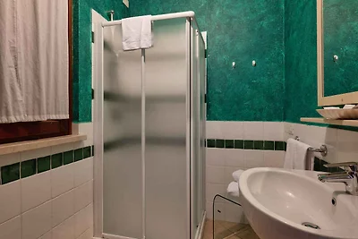 FerienWohnung mit Liegestühlen und Freibad