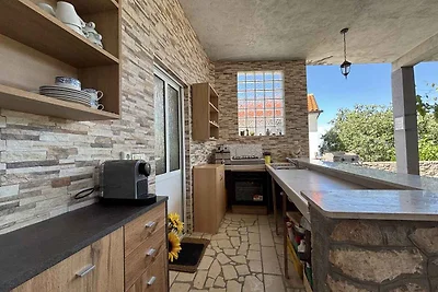 Ferienwohnung mit Pool und Meerblick
