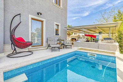 Ferienhaus mit beheiztem Privatpool