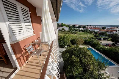 Ferienwohnung mit Pool und Meerblick