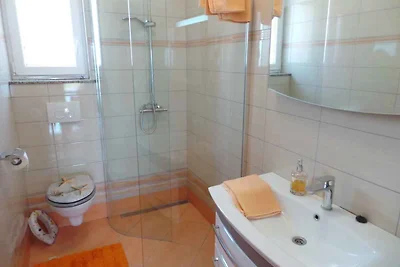 Ferienwohnung mit Pool und Meerausblick