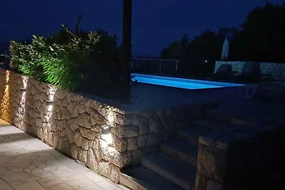 Ferienwohnung mit Pool und Meerblick
