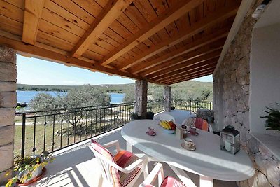 Ferienhaus mit Garten und Meerblick