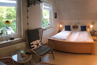 Ferienhaus mit Balkon, Terrasse und Garten
