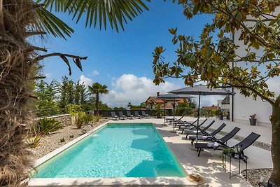 Ferienwohnung mit Pool und Meerblick