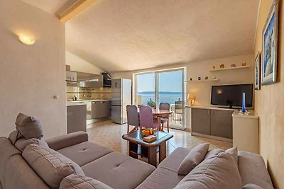 Ferienwohnung mit Pool und Meerblick
