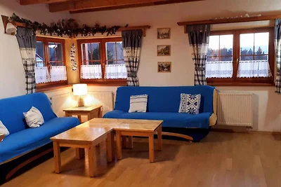 Ferienhaus mit Kamin und Sauna bei Wald
