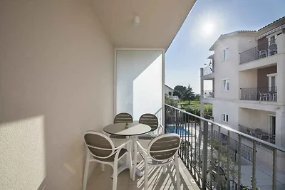 Ferienwohnung mit Balkon und Pool