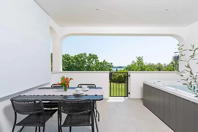 Ferienhaus mit Whirlpool und Meerblick