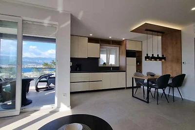 Ferienwohnung mit Swimmingpool und Meerblick