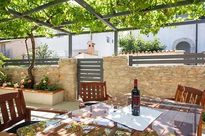 Ferienhaus mit Terrasse und Whirlpool