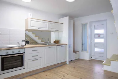 Ferienhaus mit Terrasse und Whirlpool