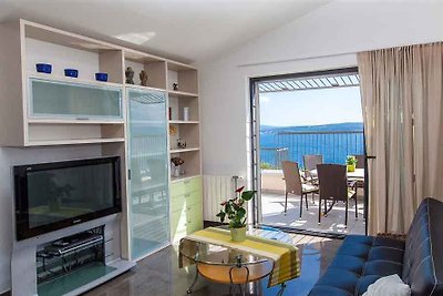 Ferienwohnung mit Terrasse und Meerblick in r