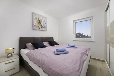 Ferienwohnung mit einen Balkon und Meerblick