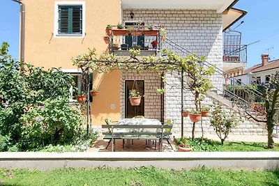 Ferienwohnung mit Terrasse 100 m vom Strand