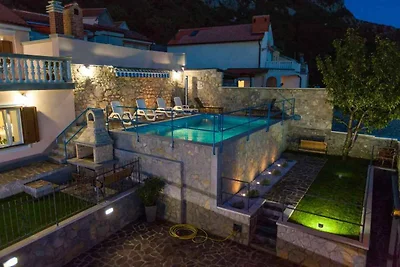 Ferienhaus mit Aussenpool und Meerblick