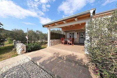 Ferienhaus mit Garten und Meerblick