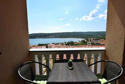 Ferienwohnung mit einen Balkon und Meerblick
