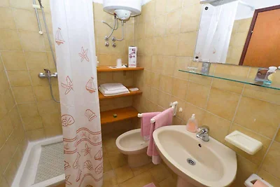 Ferienwohnung mit Balkon mit Gartenmöbeln