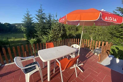 Ferienhaus mit Schaukel und Gartendusche