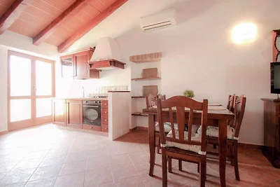 Ferienhaus mit Terrasse 200 m vom Strand