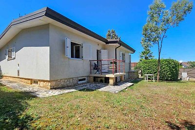 Ferienhaus mit Blick auf den Garten