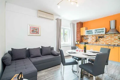 Ferienwohnung mit Garten und Klimaanlage