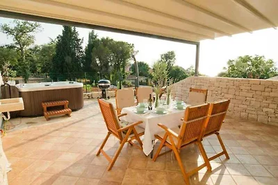 Ferienhaus mit Whirlpool und Meerblick in