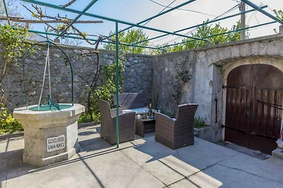 Ferienhaus mit Balkon und Klimaanlage